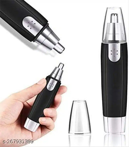 Black and silver nose hair trimmer held by a hand with additional trimmer and clear cap on a white background.